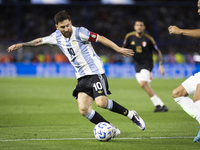 Argentina's Lionel Messi is in action during the 2026 FIFA World Cup South American qualifiers football match between Argentina and Peru at...