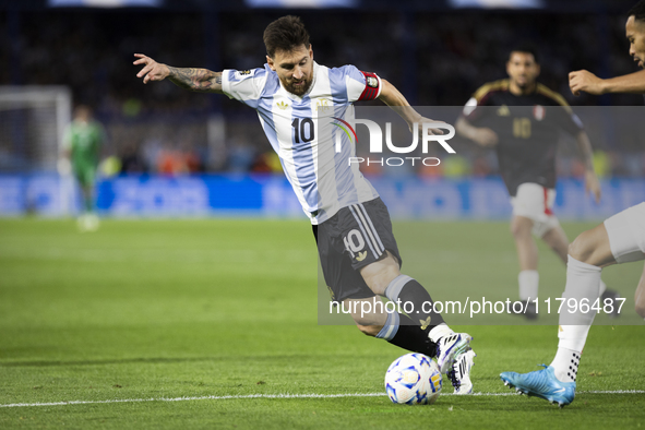 Argentina's Lionel Messi is in action during the 2026 FIFA World Cup South American qualifiers football match between Argentina and Peru at...