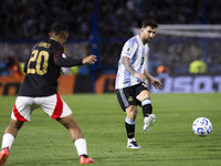 Argentina's Lionel Messi is in action during the 2026 FIFA World Cup South American qualifiers football match between Argentina and Peru at...