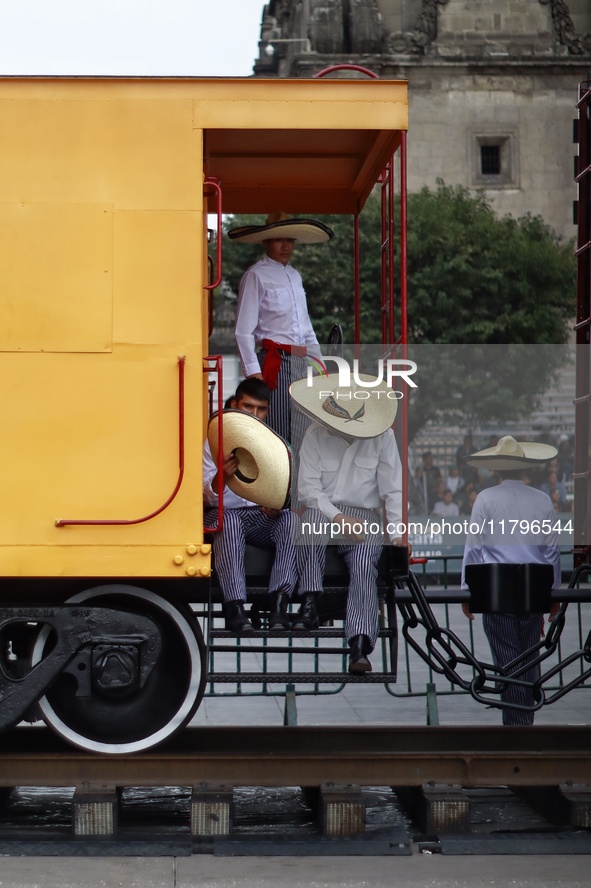 People participate in the military civic parade for the commemoration of the 114th anniversary of the Mexican Revolution at the main square...