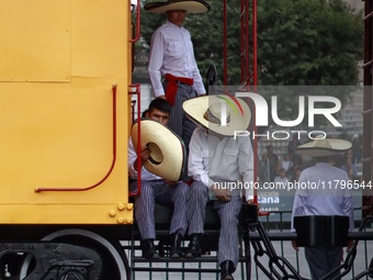 People participate in the military civic parade for the commemoration of the 114th anniversary of the Mexican Revolution at the main square...