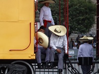 People participate in the military civic parade for the commemoration of the 114th anniversary of the Mexican Revolution at the main square...