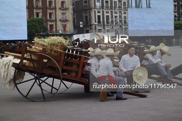 People participate in the military civic parade for the commemoration of the 114th anniversary of the Mexican Revolution at the main square...