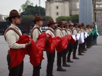 People participate in the military civic parade for the commemoration of the 114th anniversary of the Mexican Revolution at the main square...