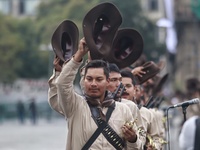 People participate in the military civic parade for the commemoration of the 114th anniversary of the Mexican Revolution at the main square...