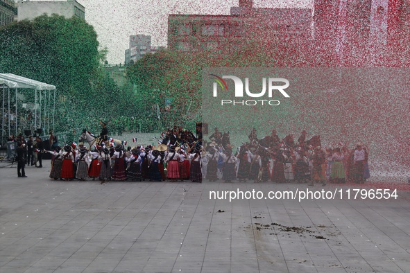 People participate in the military civic parade for the commemoration of the 114th anniversary of the Mexican Revolution at the main square...