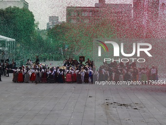 People participate in the military civic parade for the commemoration of the 114th anniversary of the Mexican Revolution at the main square...