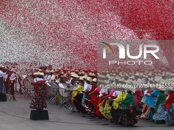 People participate in the military civic parade for the commemoration of the 114th anniversary of the Mexican Revolution at the main square...