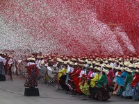 People participate in the military civic parade for the commemoration of the 114th anniversary of the Mexican Revolution at the main square...