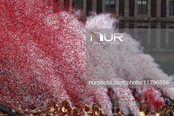 People participate in the military civic parade for the commemoration of the 114th anniversary of the Mexican Revolution at the main square...