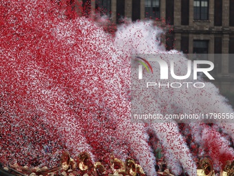 People participate in the military civic parade for the commemoration of the 114th anniversary of the Mexican Revolution at the main square...