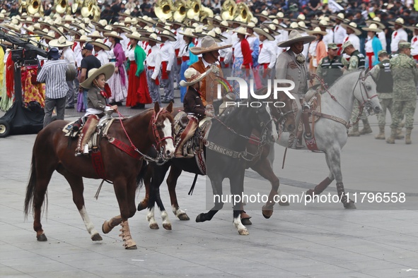 Charros take part in the military civic parade for the commemoration of the 114th anniversary of the Mexican Revolution at the main square Z...