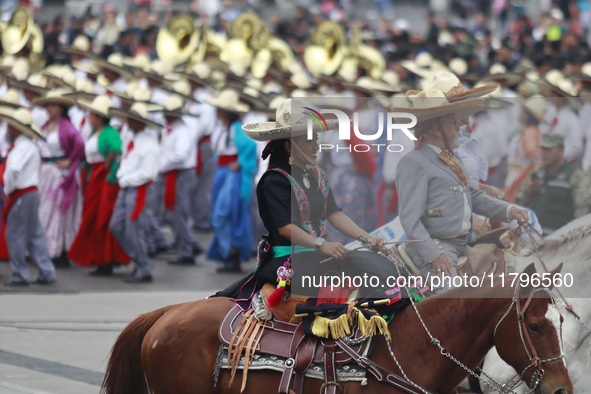 Charros take part in the military civic parade for the commemoration of the 114th anniversary of the Mexican Revolution at the main square Z...