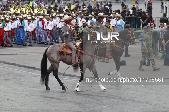 Charros take part in the military civic parade for the commemoration of the 114th anniversary of the Mexican Revolution at the main square Z...