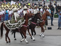 Charro women take part in the military civic parade for the commemoration of the 114th anniversary of the Mexican Revolution at the main squ...