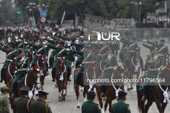 The military takes part in the military civic parade for the commemoration of the 114th anniversary of the Mexican Revolution at the main sq...