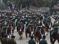 The military takes part in the military civic parade for the commemoration of the 114th anniversary of the Mexican Revolution at the main sq...