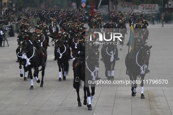 The military takes part in the military civic parade for the commemoration of the 114th anniversary of the Mexican Revolution at the main sq...