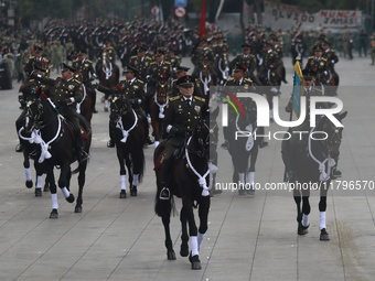 The military takes part in the military civic parade for the commemoration of the 114th anniversary of the Mexican Revolution at the main sq...