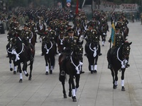 The military takes part in the military civic parade for the commemoration of the 114th anniversary of the Mexican Revolution at the main sq...