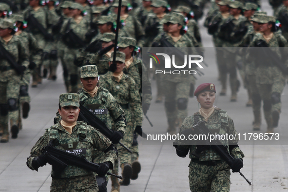 The military takes part in the military civic parade for the commemoration of the 114th anniversary of the Mexican Revolution at the main sq...