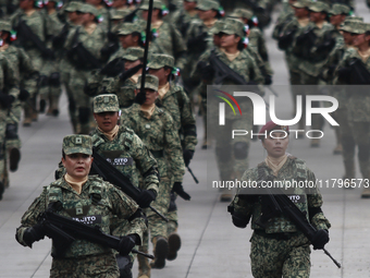 The military takes part in the military civic parade for the commemoration of the 114th anniversary of the Mexican Revolution at the main sq...