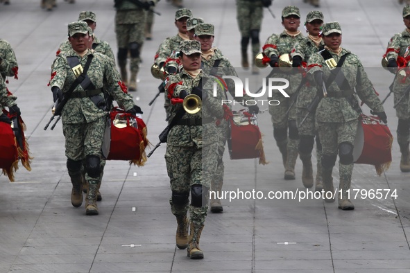 The military takes part in the military civic parade for the commemoration of the 114th anniversary of the Mexican Revolution at the main sq...