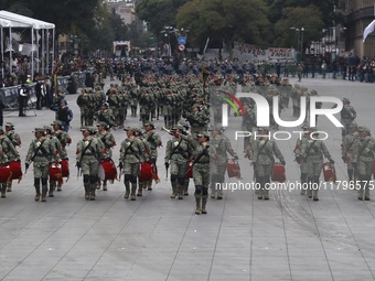 The military takes part in the military civic parade for the commemoration of the 114th anniversary of the Mexican Revolution at the main sq...