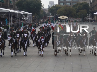 The military takes part in the military civic parade for the commemoration of the 114th anniversary of the Mexican Revolution at the main sq...