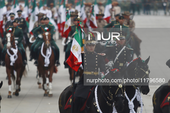 The military takes part in the military civic parade for the commemoration of the 114th anniversary of the Mexican Revolution at the main sq...