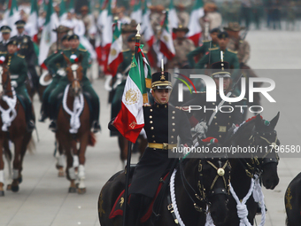 The military takes part in the military civic parade for the commemoration of the 114th anniversary of the Mexican Revolution at the main sq...