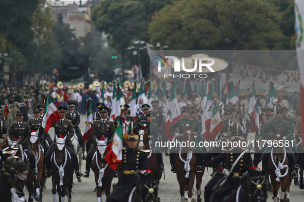 The military takes part in the military civic parade for the commemoration of the 114th anniversary of the Mexican Revolution at the main sq...