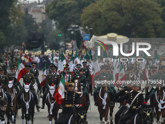 The military takes part in the military civic parade for the commemoration of the 114th anniversary of the Mexican Revolution at the main sq...