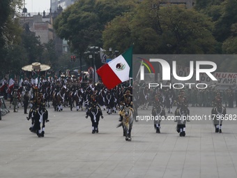 The military takes part in the military civic parade for the commemoration of the 114th anniversary of the Mexican Revolution at the main sq...