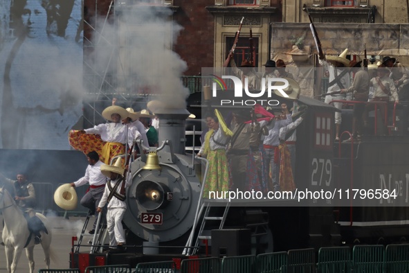 People participate in the military civic parade for the commemoration of the 114th anniversary of the Mexican Revolution at the main square...