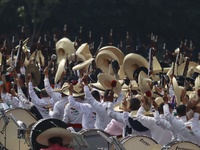 People participate in the military civic parade for the commemoration of the 114th anniversary of the Mexican Revolution at the main square...