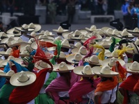 People participate in the military civic parade for the commemoration of the 114th anniversary of the Mexican Revolution at the main square...