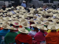 People participate in the military civic parade for the commemoration of the 114th anniversary of the Mexican Revolution at the main square...