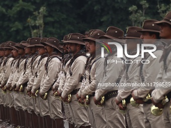 People participate in the military civic parade for the commemoration of the 114th anniversary of the Mexican Revolution at the main square...