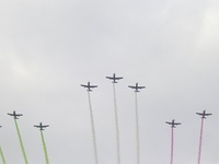 Pilots fly in the sky during the military civic parade for the commemoration of the 114th anniversary of the Mexican Revolution at the main...