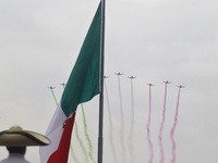 Pilots fly in the sky during the military civic parade for the commemoration of the 114th anniversary of the Mexican Revolution at the main...