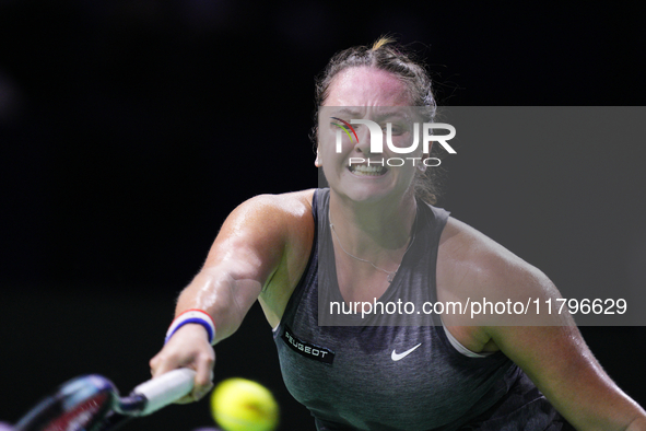 MALAGA, SPAIN - NOVEMBER 19:  Viktoria Hruncakova of Slovakia in her singles match against Lucia Bronzetti of Team Italy in the final tie be...