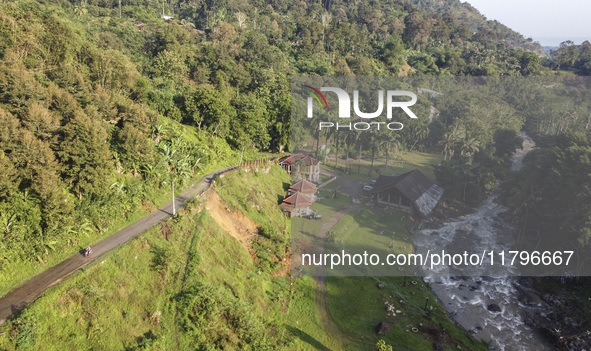 Landslides are seen in the camping ground area after a flash flood and landslide hit Mekarbuana village, Karawang district, West Java, on No...