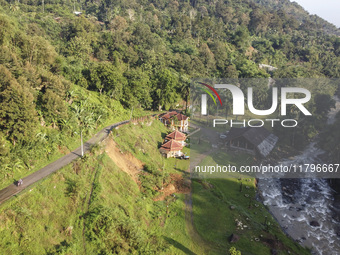 Landslides are seen in the camping ground area after a flash flood and landslide hit Mekarbuana village, Karawang district, West Java, on No...