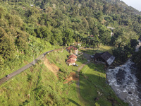 Landslides are seen in the camping ground area after a flash flood and landslide hit Mekarbuana village, Karawang district, West Java, on No...