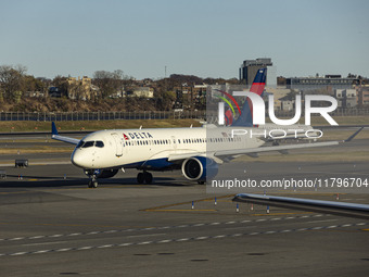 Delta Air Lines Airbus A220-300 passenger aircraft spotted taxiing on the runway and taxiway of LaGuardia airport in NYC. The narrow body Ai...