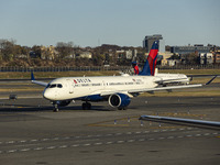 Delta Air Lines Airbus A220-300 passenger aircraft spotted taxiing on the runway and taxiway of LaGuardia airport in NYC. The narrow body Ai...