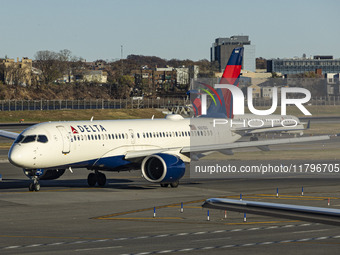 Delta Air Lines Airbus A220-300 passenger aircraft spotted taxiing on the runway and taxiway of LaGuardia airport in NYC. The narrow body Ai...