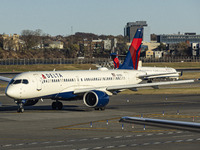 Delta Air Lines Airbus A220-300 passenger aircraft spotted taxiing on the runway and taxiway of LaGuardia airport in NYC. The narrow body Ai...