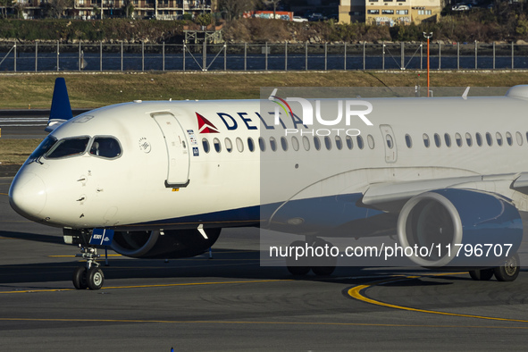 Delta Air Lines Airbus A220-300 passenger aircraft spotted taxiing on the runway and taxiway of LaGuardia airport in NYC. The narrow body Ai...